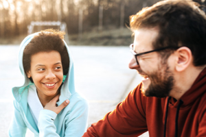 dad and kid looking at each other and smiling