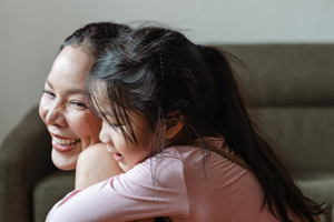 child hugging mom