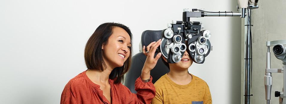 kid and parent during eye exam