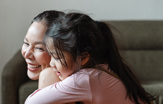 child hugging mom
