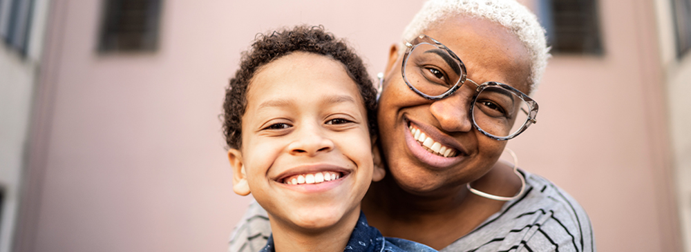 Smiling woman and boy