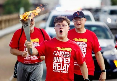 Special Olympics torch runner