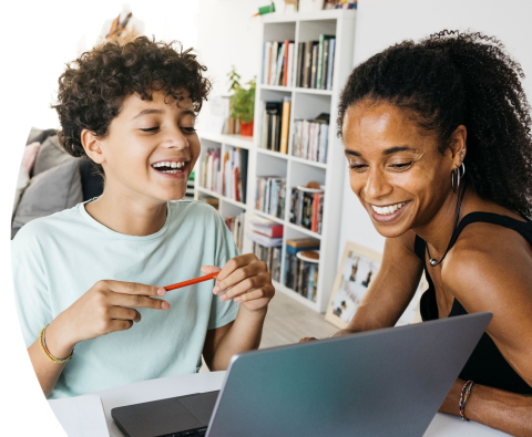 Mother and child smiling together discussing vision care options