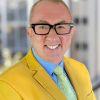 Headshot of licensed master optician Andrew Bruce