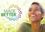 picture of smiling woman outside with CooperVision Made Better logo next to her